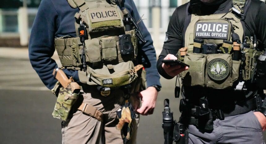 Police, acting as ICE officers