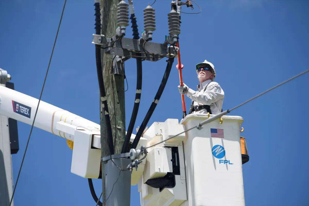 Line worker in FPL lift bucket