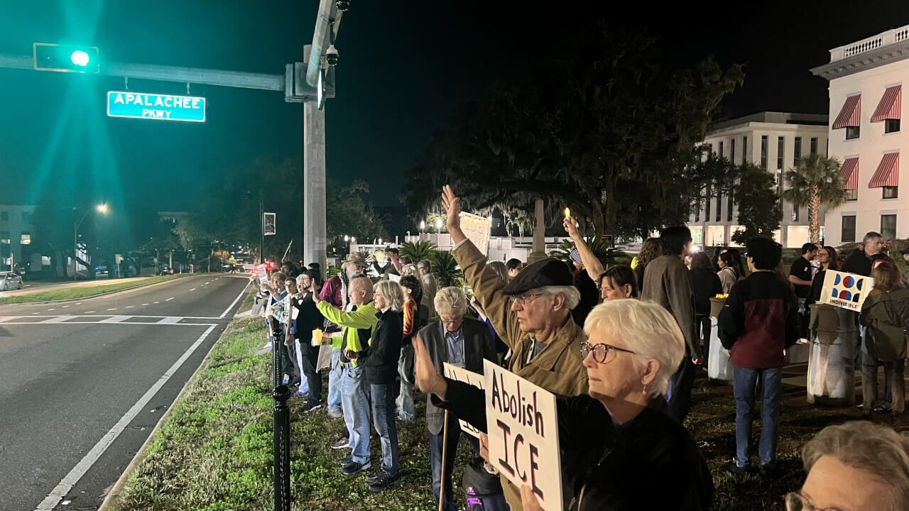 Crowd gathered in front of the Florida capitol for Renee Good vigil.