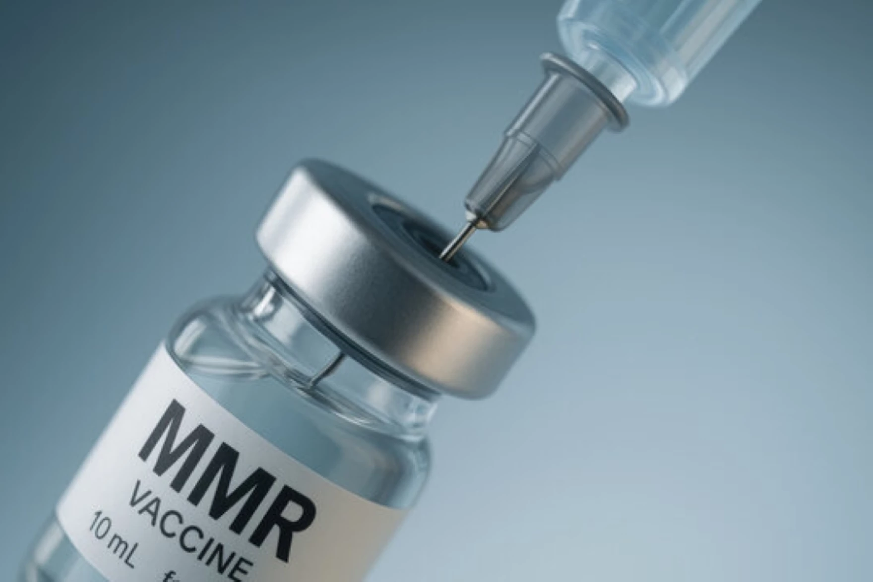 Measles vaccine being drawn out by a syrinige