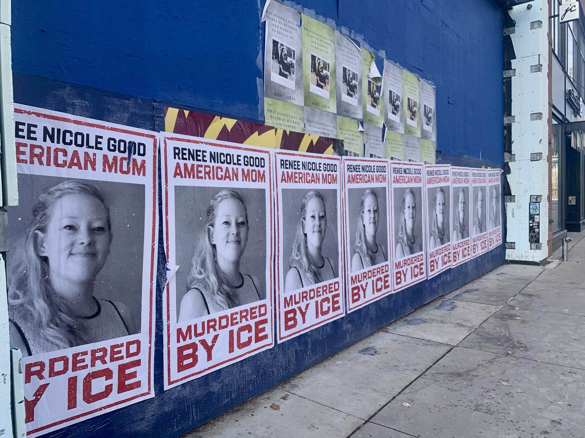 A row of posters for Renee Good, American Mom
